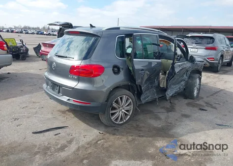 2014 Volkswagen Tiguan Sel z USA, uszkodzony, nr VIN WVGAV3AX3EW510426